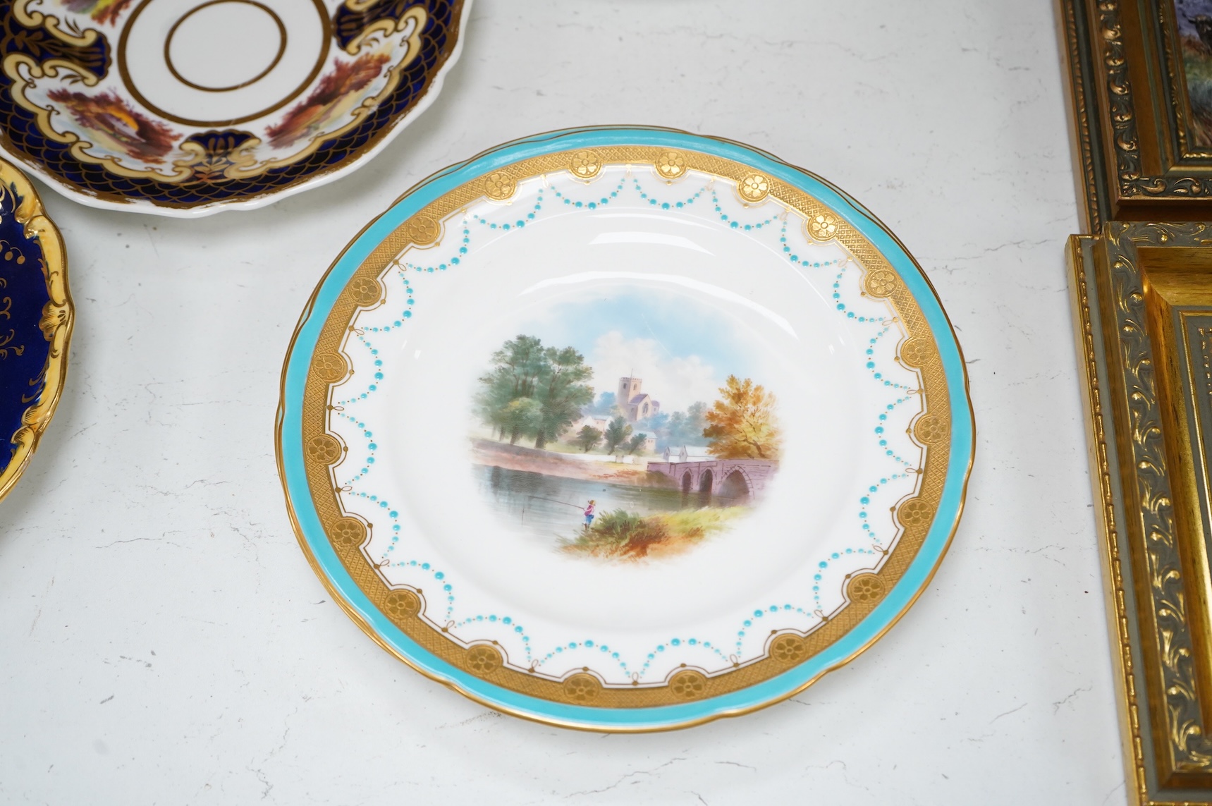 A collection of 19th century English dessert wares to include a pair of Flight, Barr and Barr ‘fantastic birds’ green ground dessert plates, various Ridgway dessert plates, five Minton botanical plates with tooled gilt b